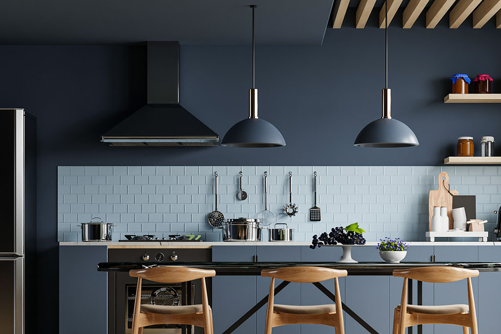 Dark blue kitchen with blue backsplash