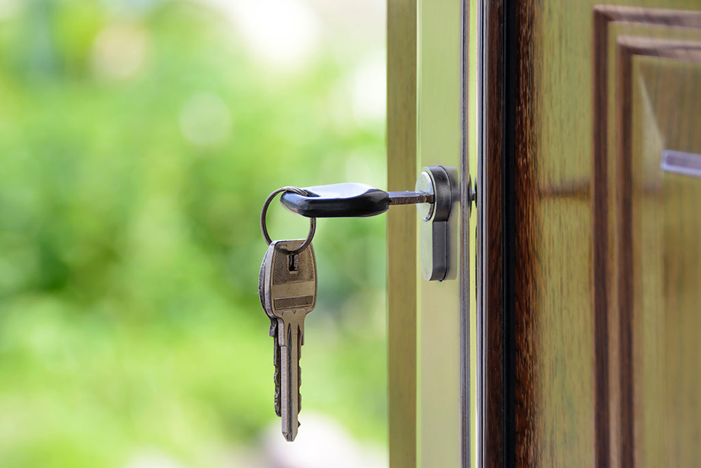 House keys unlocking door