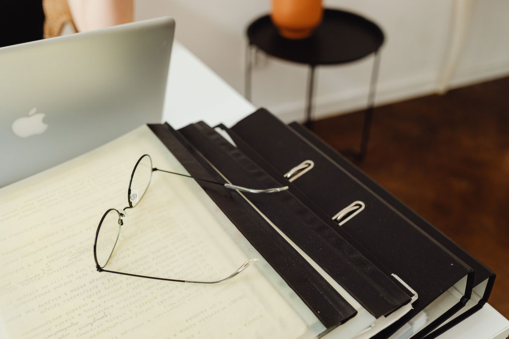 Documents stacked on desk