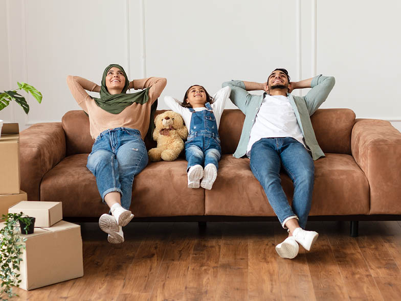Family relaxing on couch