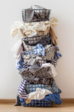 Unwanted clothes stacked in baskets