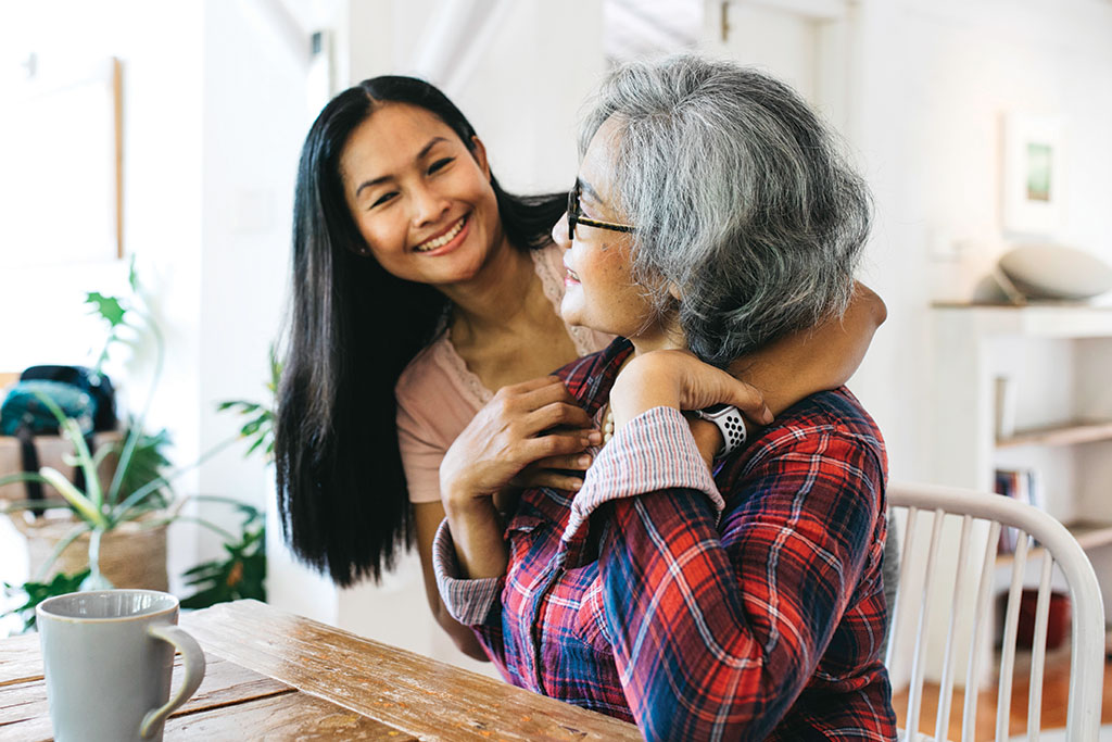 Grandma and granddaughter hugging