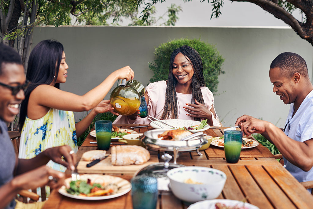 Family eating dinner outside