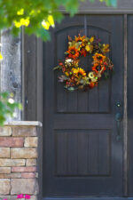 Front door decorated for fall