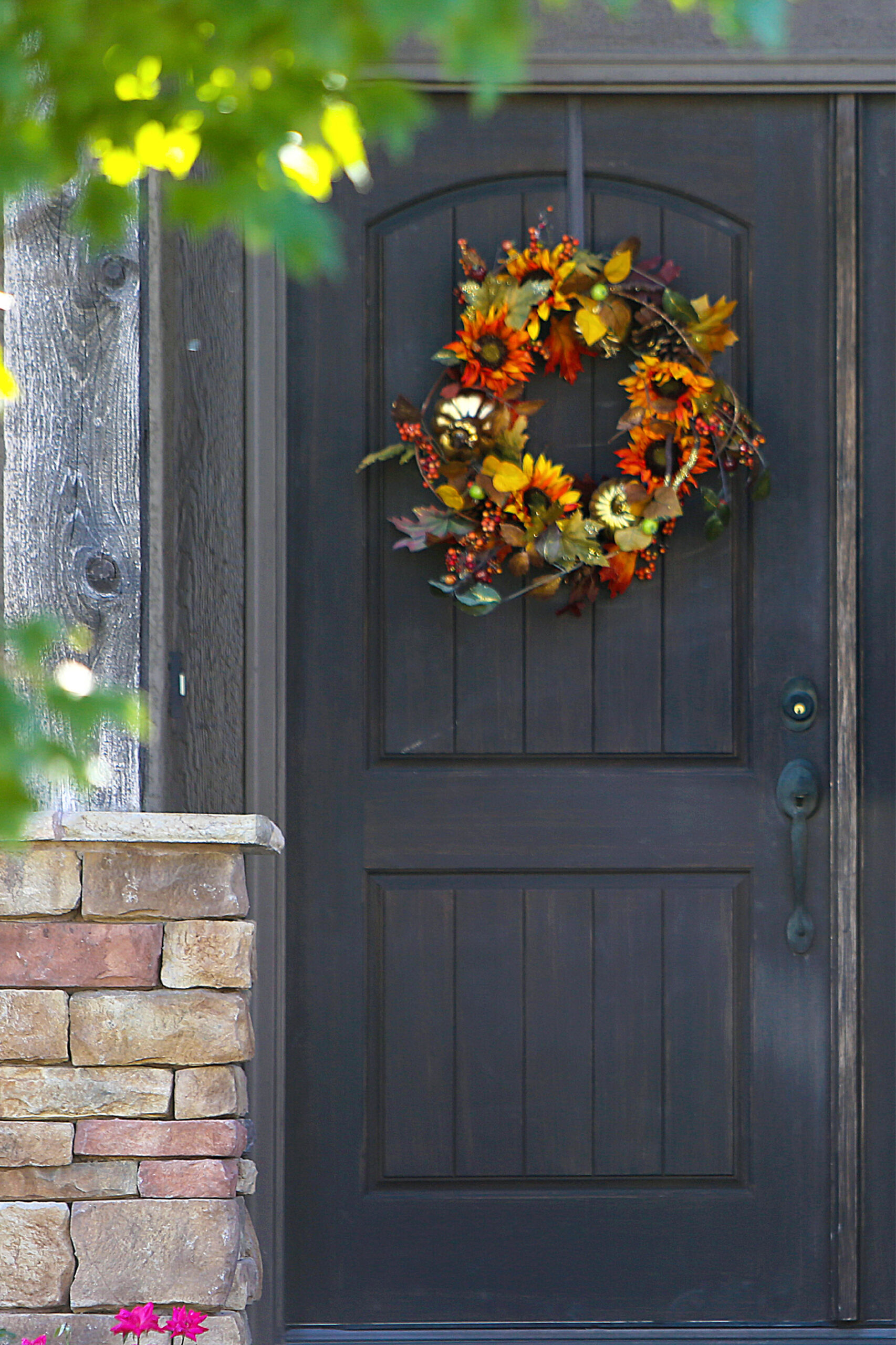 Front door decorated for fall