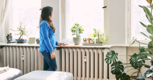 Woman looking out window