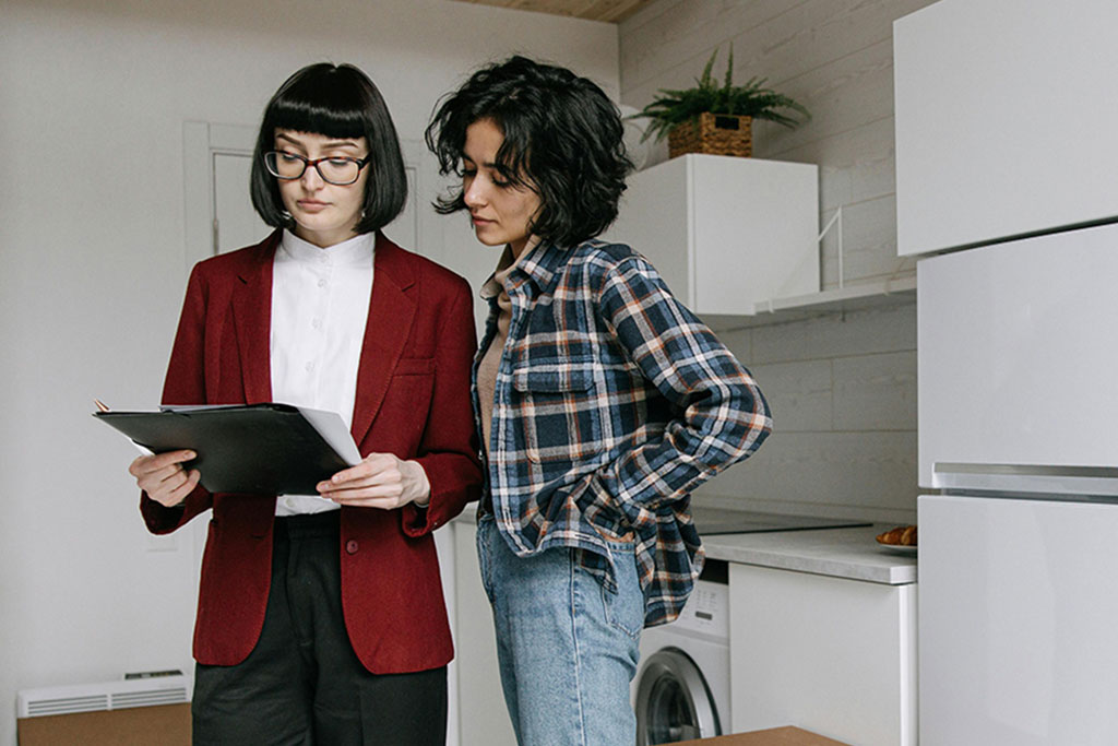 Woman talking to realtor