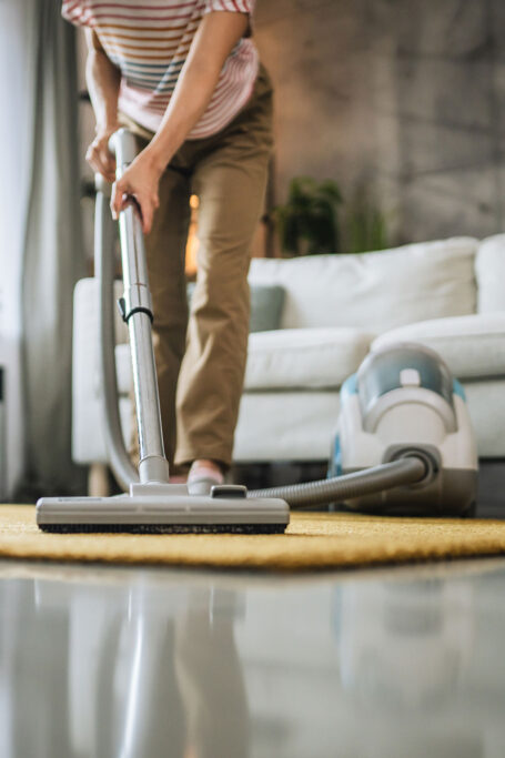 Person vacuuming