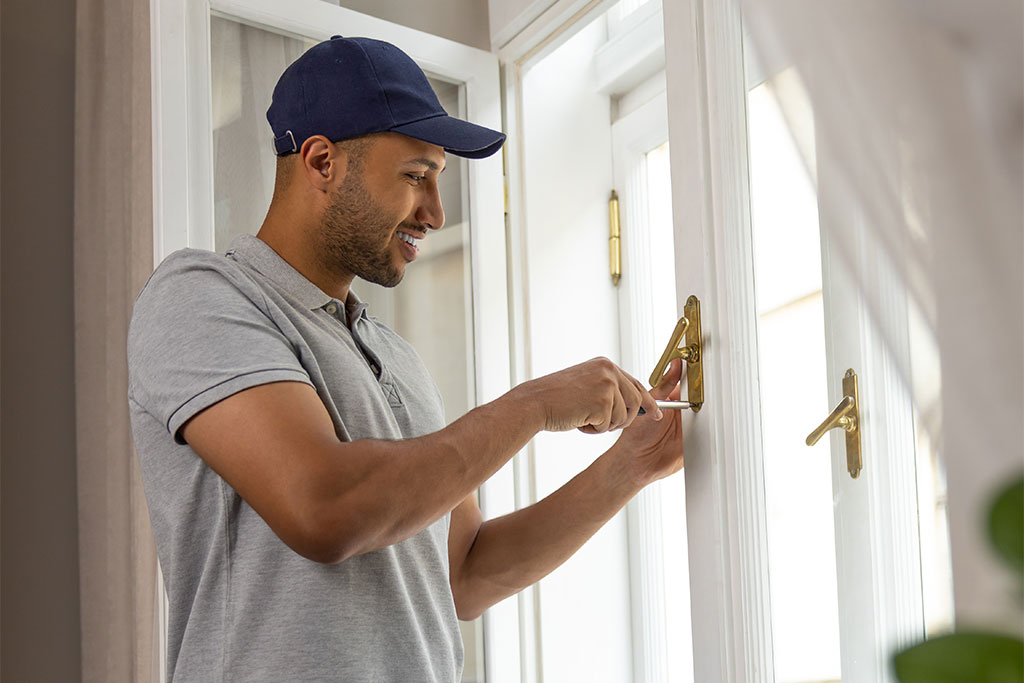 Man fixing door