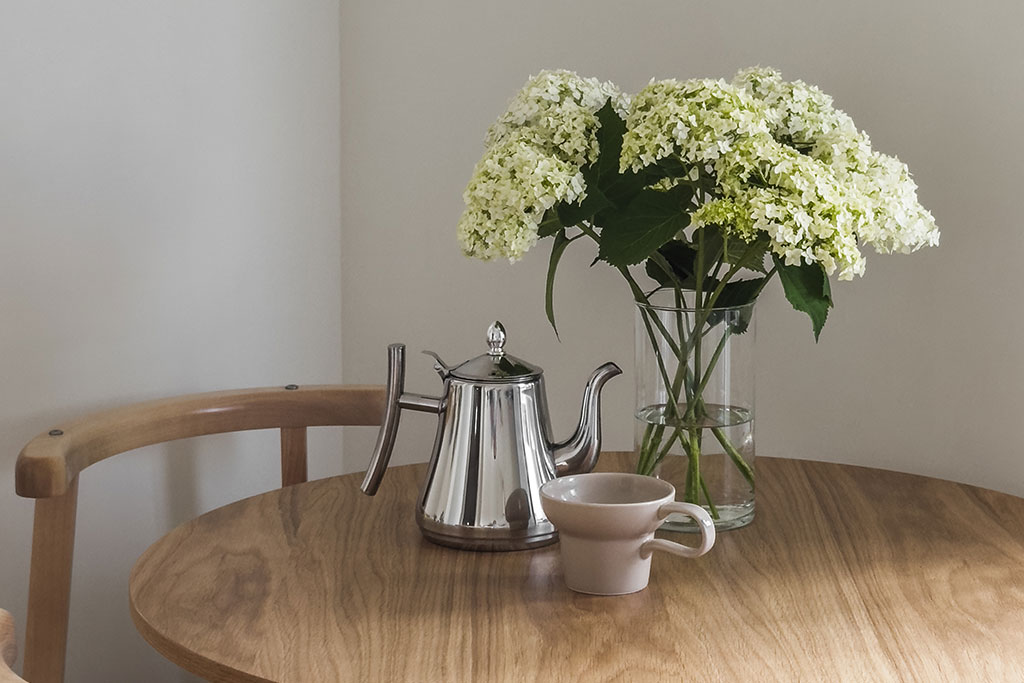 Hydrangeas on table in vase