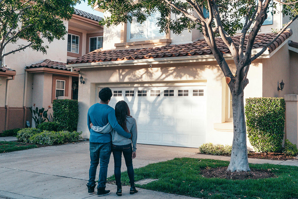 Couple looking at house