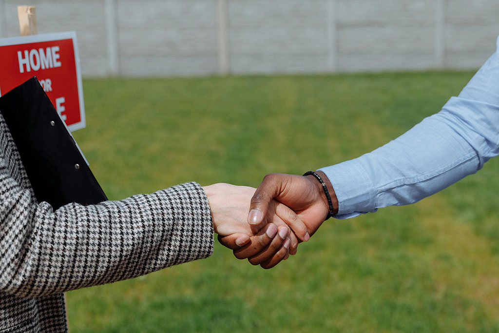 Buyers and seller shaking hands