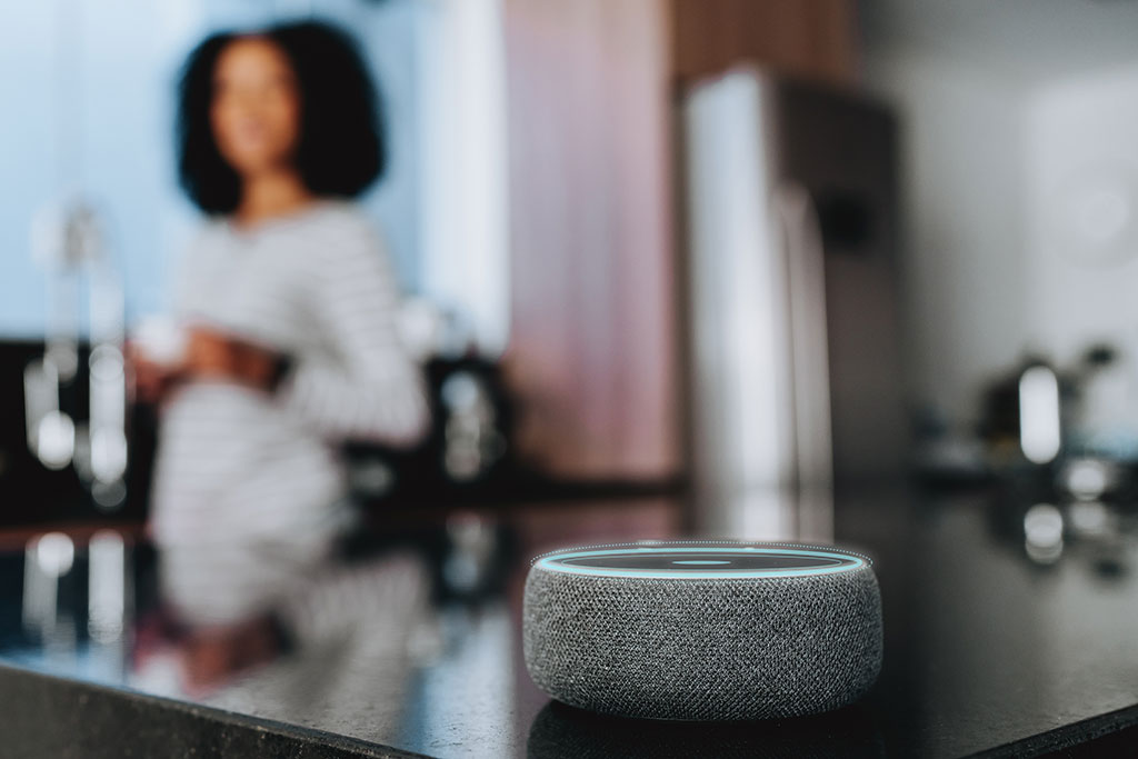 Woman talking to smart home