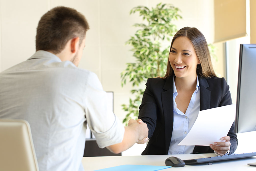 Shaking hands with advisor