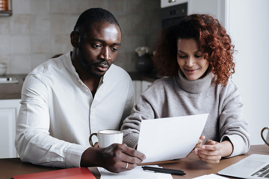 Couple looking over paper work