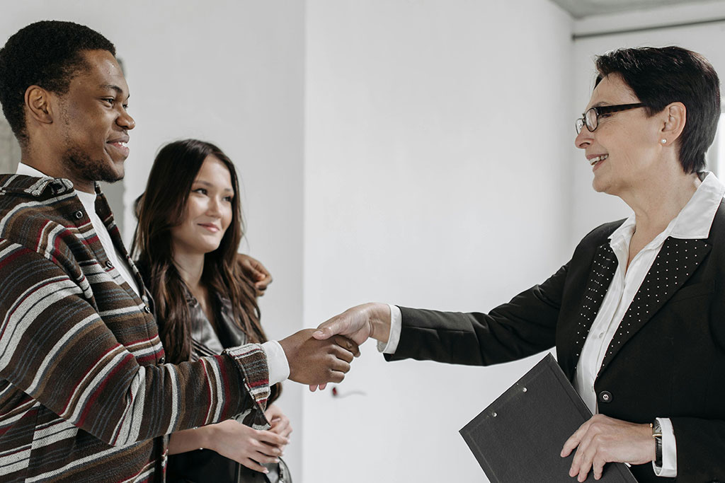 Shaking hands with realtor