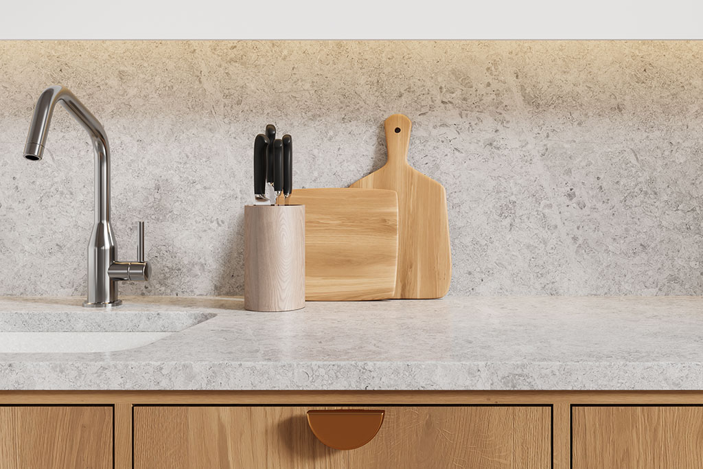 Light and warm kitchen backsplash and countertop