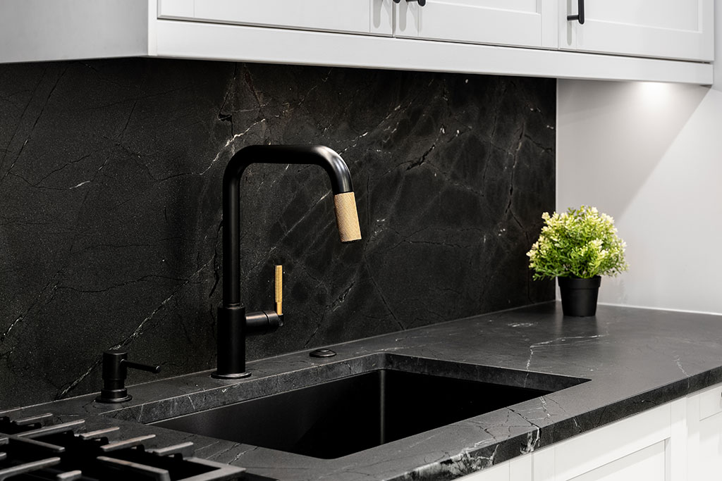 Black kitchen backsplash and countertop