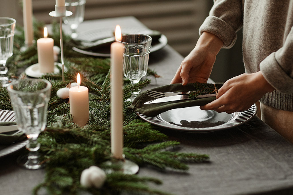 Person setting table